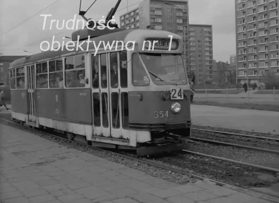 354
Kadr z filmu "Trudności bardzo obiektywne".
Słowa kluczowe: 13N 354 Towarowa