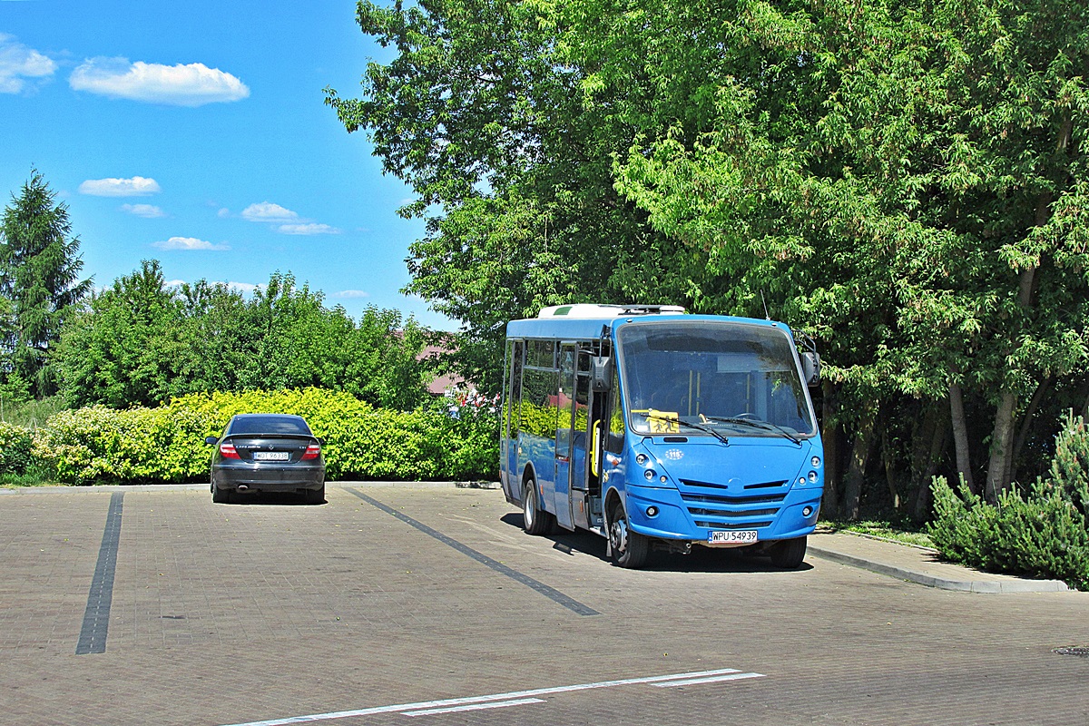 Iveco Daily 65C17 / Kapena Urby LE WPU 54939
Nieporęt, ul. Zegrzyńska. 
Słowa kluczowe: szkolny